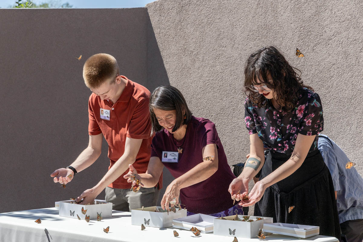 Participants working together at a hands-on activity table